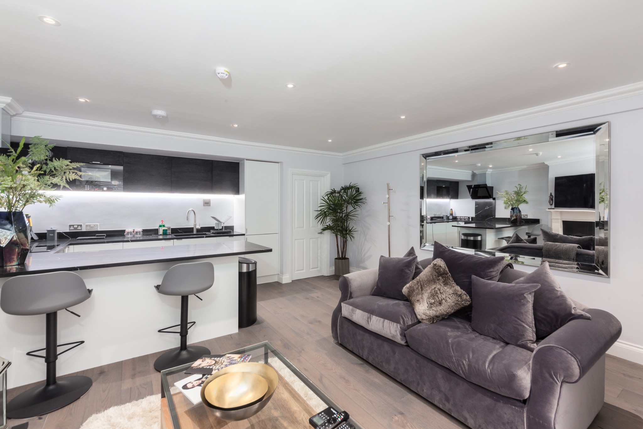 Chelsea open-plan kitchen and living room with monochrome finishes